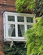 Fancy Oriel window in Queen Anne Revival style.jpg