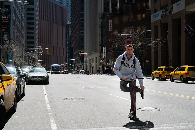 File:Guy on a scooter (44759596865).jpg