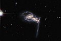 Hubble Spots Squabbling Galactic Siblings - Flickr - NASA Goddard Photo and Video.jpg