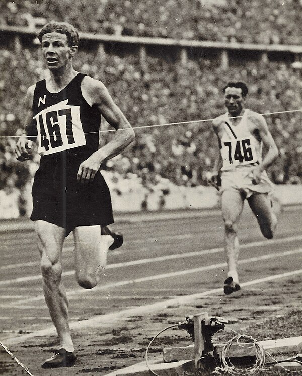 Jack Lovelock breaking the finishing line at the Summer Olympic Games 1936 in Berlin