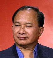 John Woo's film Hard Boiled significantly influenced the conception of Shoot 'Em Up. John Woo Cannes 2005.jpg