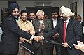 Kapil Sibal witnessing the exchange of an MoU, signed between Power Finance Corporation Ltd. And National Literacy Mission Authority to formalize the arrangements for cooperation between them.jpg