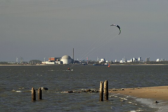 Kite Surfer on Elbe River near nuclear power plant Stade, Germany