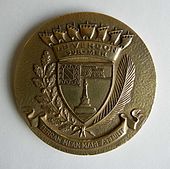 Médaille du Verdon-sur-Mer avec sa devise : Terram meam mare attulit.