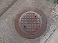 A manhole cover of the Virginia Department of Highways (VDH) located near 1073 Mt Laurel Rd, Clover, Virginia.