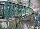 Matlock - footbridge to Pic Tor (Geograph-2242688-by-Dave-Bevis).jpg