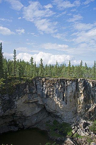 The rock above the waterfall in McNallie Creek Territorial Park McNallie Creek Territorial Park 4.jpg