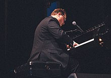 Michael Eckroth performing in 2019