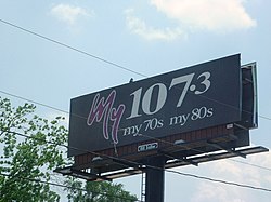 A billboard in downtown Pensacola advertising the change in format. My10732.jpg