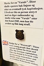 Thumbnail for File:Nazi Germany WW2 Werwolf member badge. Werewolf was a secret operation plan and guerilla force 1944-1946 for resistance behind enemy lines before and after German capitualtion. text. Lofoten Krigsminnemuseum, Norway 2019-05-08 DSC00278.jpg