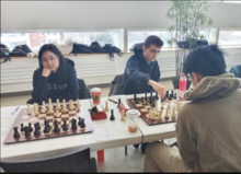 WIM Yunshan Li (Board 2 left) and IM Nicholas Vettese (Board 1, right) representing University of Toronto and the Hart House Chess Club in Ottawa during the 2023 Canadian University Chess Championship NicholasVetteseAndYunshan.png
