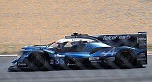 Caldwell in the Alpine Oreca 07 at the 2023 24 Hours of Le Mans. Oreca 07 - Andre Negrao, Olli Caldwell & Memo Rijas approaches the Esses at the 2023 Le Mans (53380493620).jpg