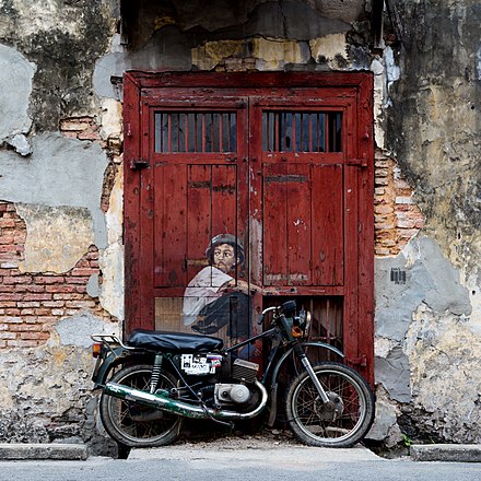 Boy on a Bike by Ernest Zacharevic