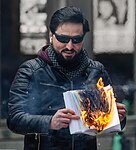 Koranbränning av Salwan Momika på Benny Fredrikssons torg i Stockholm i oktober 2023.