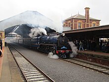 Victorian Railways R class steam train on a heritage tour at Geelong Station, run by volunteer group Steamrail Victoria R711 at Geelong Station.jpg