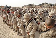 Marines of 3rd LAR pray during a memorial service for their fallen brothers. Rawah Memorial.jpg