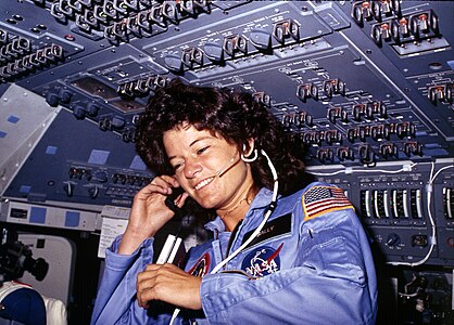 Sally Ride, America's first woman astronaut communitcates with ground controllers from the flight deck.