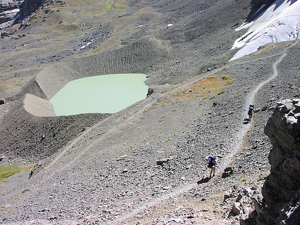 Tarn—a proglacial lake impounded by the terminal moraine of the retreating Schoolroom Glacier in Grand Teton National Park, Wyoming