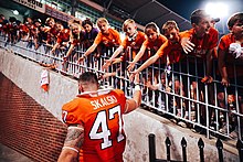 Young fans loving Skalski as he exists Memorial Stadium after defeating Georgia Tech 14–8, 2021.