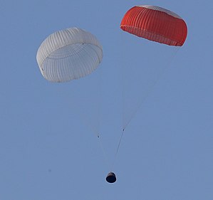 The Gaganyaan Crew Module boilerplate, after jettisoning the Crew Escape System (CES), floats back to the ground under its parachutes over the Bay of Bengal, about 2.9 km from the Satish Dhawan Space Centre, Sriharikota. The Crew Module, part the Crew Escape System (CES), floating back to earth under its parachutes over the Bay of Bengal about 2.9 km from the Satish Dhawan Space Centre, Sriharikota.JPG