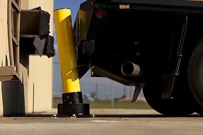 Truck collision with a rebounding bollard.jpg