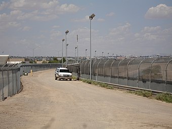 The U.S.–Mexico border fence near El Paso, Texas.