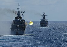 US Navy 110422-N-ZI300-115 The Brazilian navy frigate Bosisio (F 48) fires at an unmanned aerial vehicle during a drone exercise (DRONEX) with ship.jpg