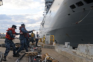 US Navy 120126-N-SB587-516 Sailors from the amphibious assault ship USS Kearsarge (LHD 3) moor the French navy amphibious assault ship FS Mistral.jpg