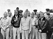 VADM William F. Halsey with members of his staff, ca. 1941-42. His yeomen are at the far right: (from right to left) Yeoman I.N. Bowman; CY H.C. Carroll; and CY P.T. Hunt.