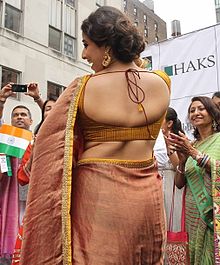 New York City's annual India Day Parade, the world's largest Indian Independence Day parade outside India, marches down Madison Avenue in Midtown Manhattan. The parade addresses controversial themes, including racism, sexism, corruption, and Bollywood. Vidya Balan Insult India Parade or Bollywood Parade.jpg
