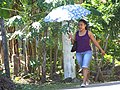 Woman with Parasol - Balgue - Ometepe Island - Nicaragua (31668997252).jpg