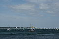 Various yachts racing in the Solent off Cowes, Isle of Wight, during Cowes Week 2010. The photograph was taken from outside the Royal Yacht Squadron.