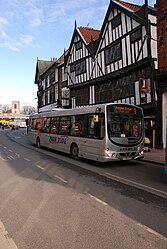 York Park & Ride bus passing Tudor building on Coppergate.