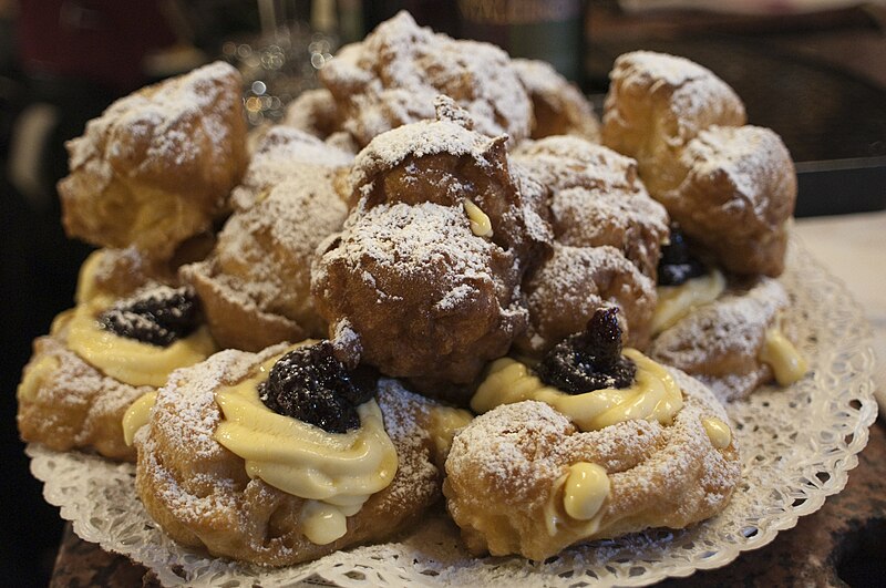 File:Zeppole stacked on a plate.jpg