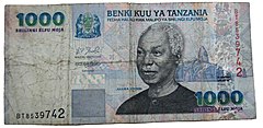 monbileto de 1000 ŝilingoj kun portreto de Julius Nyerere