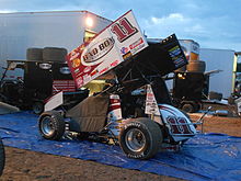 Steve's 2013 car in the pits at the Beaver Dam Raceway. 11 Steve Kinser 2013.JPG