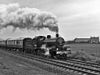 LMS 13809, a preserved 7F locomotive, working the Hellifield to Carnforth leg of a Cumbrian Mountain Pullman in 1983