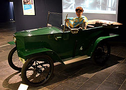 A Hawa 40 volt small electric car in the Hanover Historical Museum;  charged with Kathleen Biercamp, co-curator of the exhibition Hannover! ...