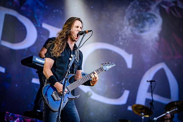 Jansen playing at Wacken Open Air, in 2018.