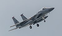 A US Air Force F-15C Eagle, tail number 85-0115, on final approach at Kadena Air Base in Okinawa, Japan