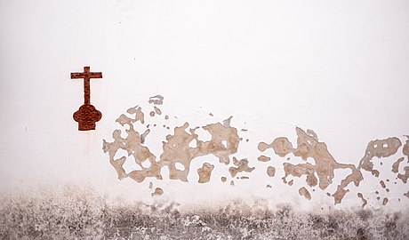 A cross painted on the wall of the São Bartolomeu de Messines Church, Via Algarviana, Portugal