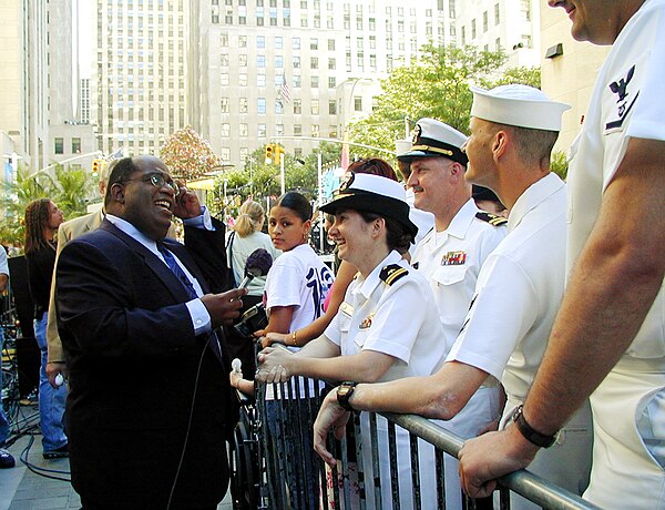 Roker with members of the United States Navy, 2000