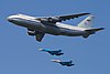 An-124 RA-82028 in formation with Su-27 09-May-2010.jpg