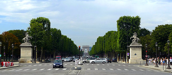 The Arc de Triomphe is located on Paris's Axe historique, a long perspective that runs from the Louvre to the Grande Arche de la Défense.