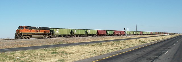 BNSF Dash 9-44CW #1041 leading a manifest freight train northwest of Shallowater, Texas, running on former ATSF railroad tracks that run parallel to U