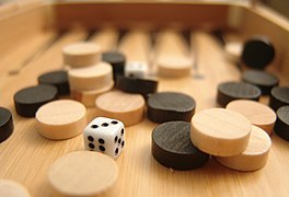 Backgammon (nard) dice and beads.