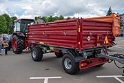 Беларуская: Трактар Беларус (МТЗ) 82.3. Мінск, Беларусь English: Belarus 82.3 tractor with a grain truck trailer. Minsk, Belarus Русский: Трактор Беларус (МТЗ) 82.3. Минск, Беларусь