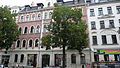 Apartment building in closed development and workshop building in the courtyard