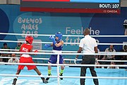 Deutsch: Boxen bei den Olympischen Jugendspielen 2018 Tag 12, 18. Oktober 2018 - Finale Fliegengewicht Mädchen – Martina La Piana (Italien, blau) schlägt Adijat Gbadamosi (Nigeria, rot) 5-0; Ringrichter ist James Beckles (Trinidad und Tobago). English: Boxing at the 2018 Summer Youth Olympics on 18 October 2018 – Girl's flyweight Gold Medal Bout - Martina La Piana (Italy, blue) beats Adijat Gbadamosi (Nigeria, red) 5-0; Referee is James Beckles (Trinidad and Tobago). Español: Boxeo en los Juegos Olímpicos Juveniles de Verano de 2018 en 18 de octubre de 2018 - Combate a medalla de oro de peso mosca para mujeres: Martina La Piana (Italia, azul) le gana a Adijat Gbadamosi (Nigeria, roja) 5-0; El árbitro es James Beckles (Trinidad y Tobago).