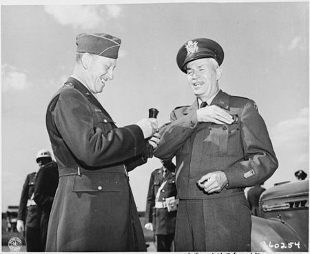 Brig. Gen. Earl Hoag, left, Commanding General of the Air Transport Command, greets Gen. Brehon Somervell on Gen.... - NARA - 198866.jpg